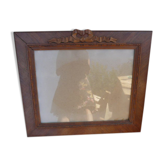 Wooden glass frame with knot