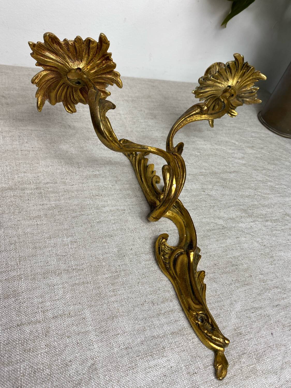 Two Louis XV style bronze wall candlesticks