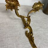 Two Louis XV style bronze wall candlesticks