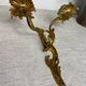 Two Louis XV style bronze wall candlesticks