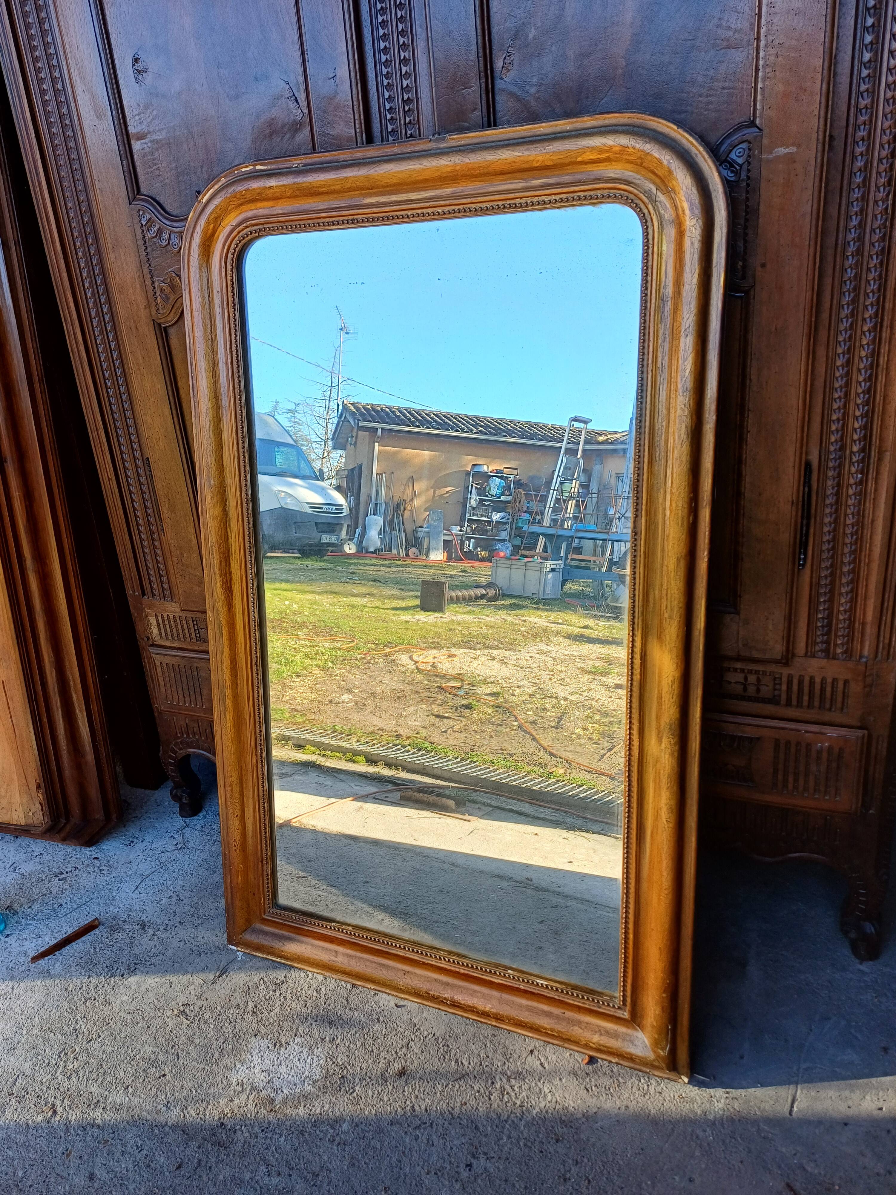 Napoleon III mirror in wood and gilded stucco