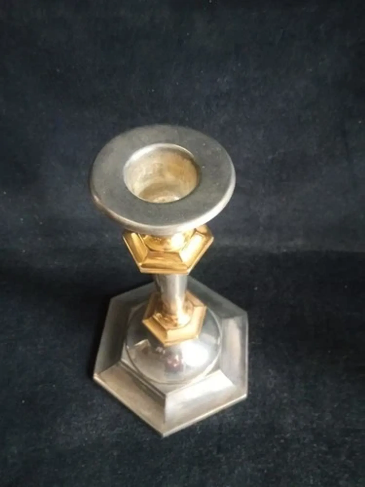 Pair of small English candlesticks in silver-plated metal and brass - 20th century.