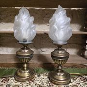 Small globe lamp with flame and brass base for oil.