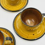 Set of four vintage Boch Palma cups and saucers.