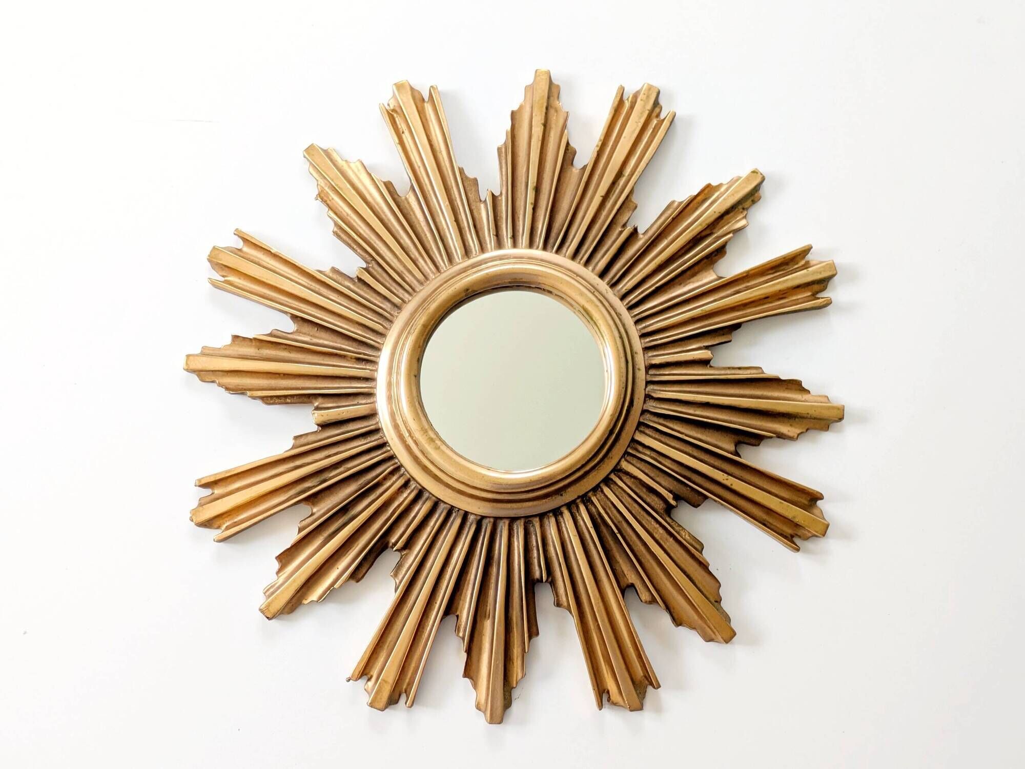 Vintage sunburst mirror in wood and gold resin, 1960s–70s
