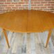 Wooden oval table and 6 matching chairs 60