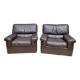 Pair of chocolate leather lounge chairs