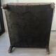 Club armchair in studded leather - early twentieth century