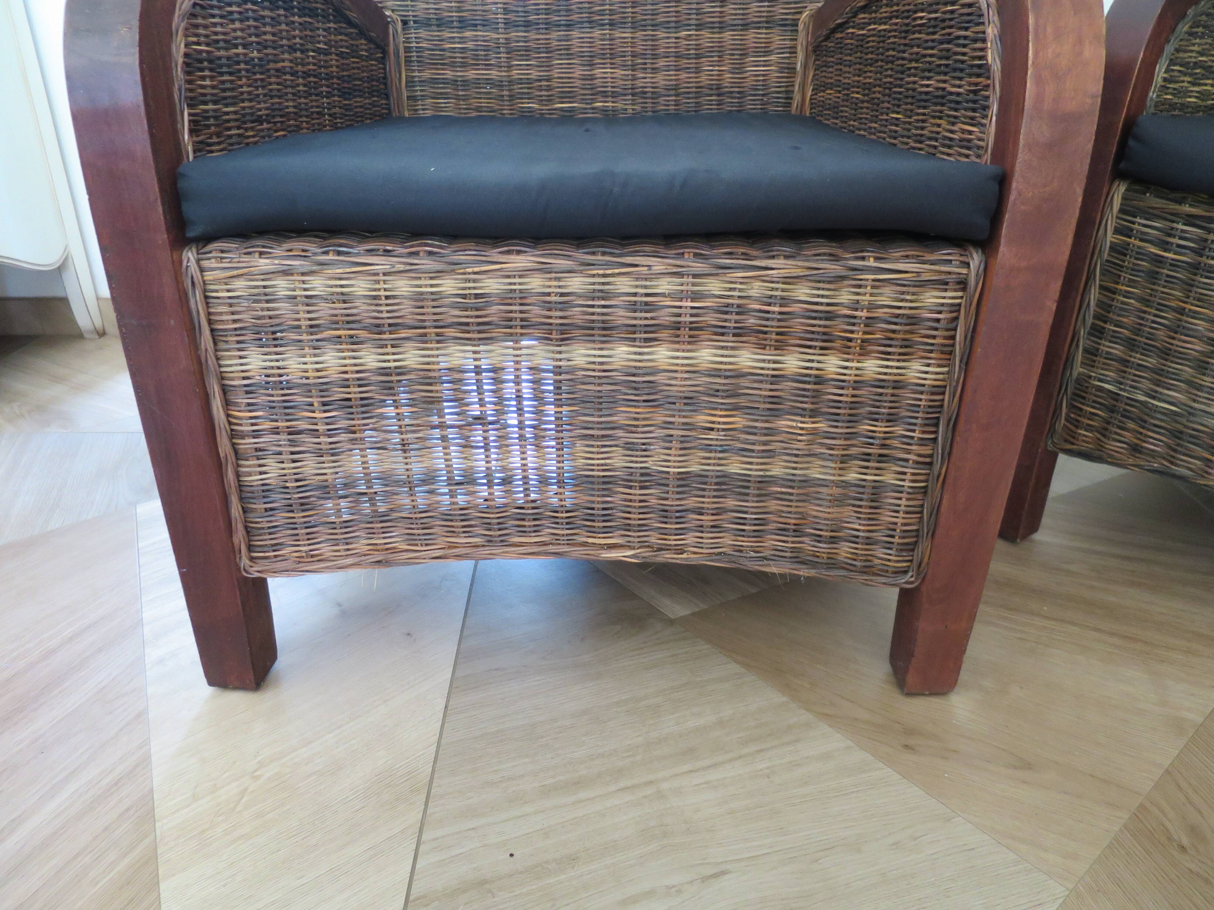 2 colonial-style armchairs in woven rattan and exotic wood