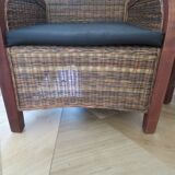 2 colonial-style armchairs in woven rattan and exotic wood