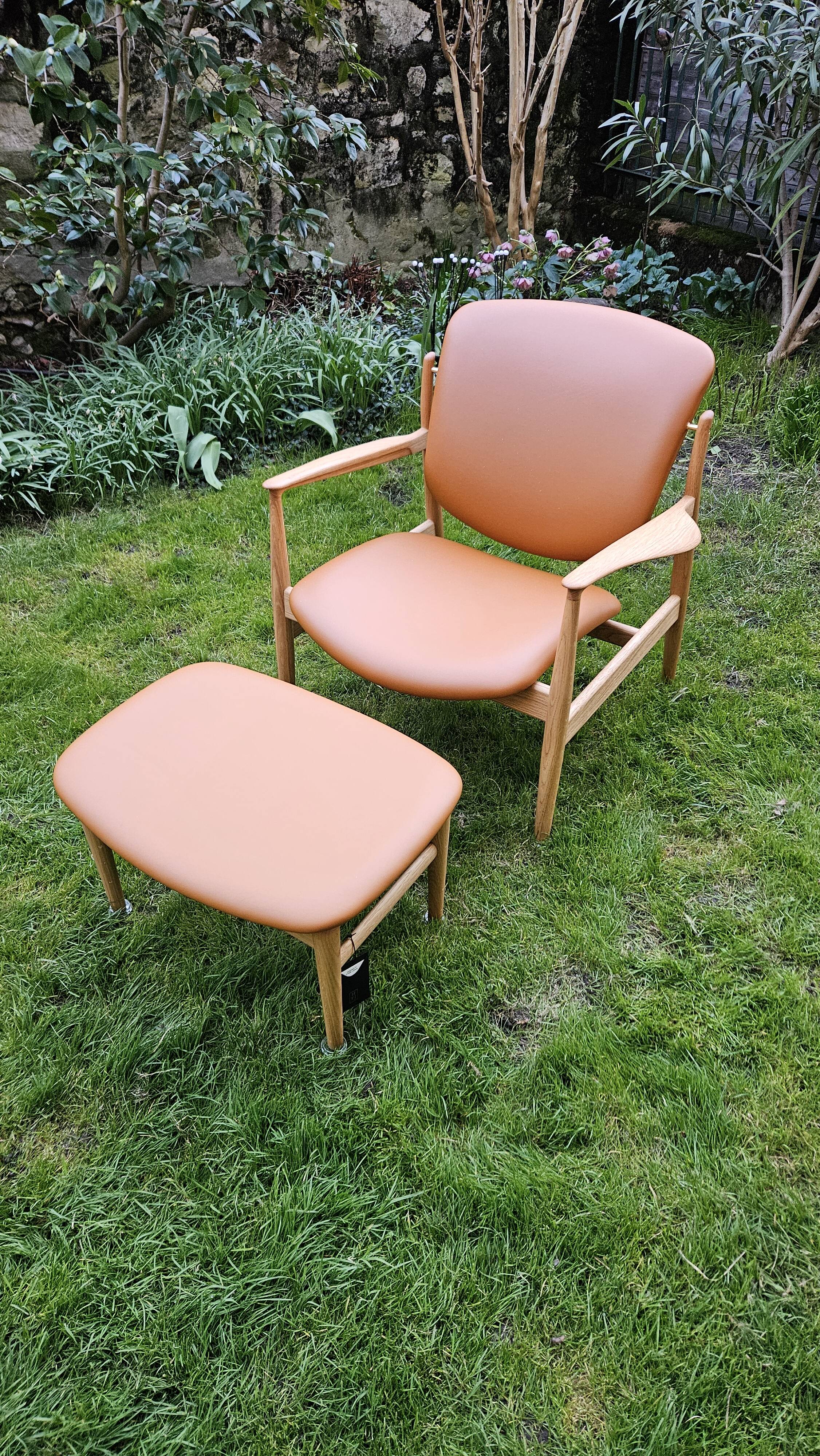 2 "The French Chair" seats by designer Finn Juhl and 1 matching footrest.