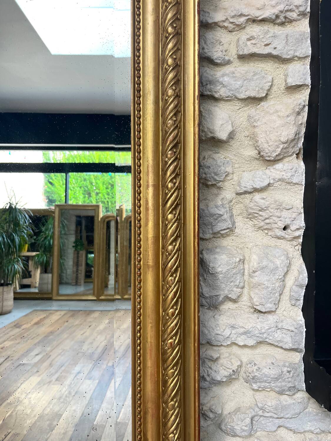 Pedimented mirror 184.5cm/135cm gilded with gold leaf