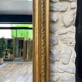 Pedimented mirror 184.5cm/135cm gilded with gold leaf