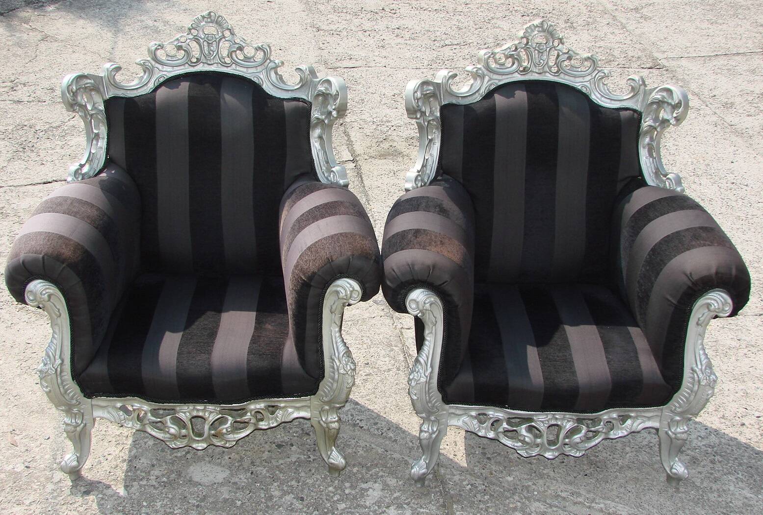 A pair of vintage armchairs, 1980s, lacquered wood and fabric