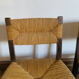 Pair of low wooden and straw armchairs