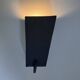 Pair of black stoneware graphic wall lights with handmade ring.