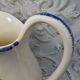 1 St Clément earthenware pouring jug decorated with characters