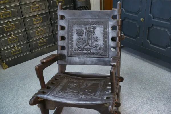 Armchair with ottoman by Angel Pazmino in wood and brown leather 1960's