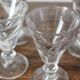 4 antique stemmed wine glasses with flat sides, made of blown glass from the 19th century