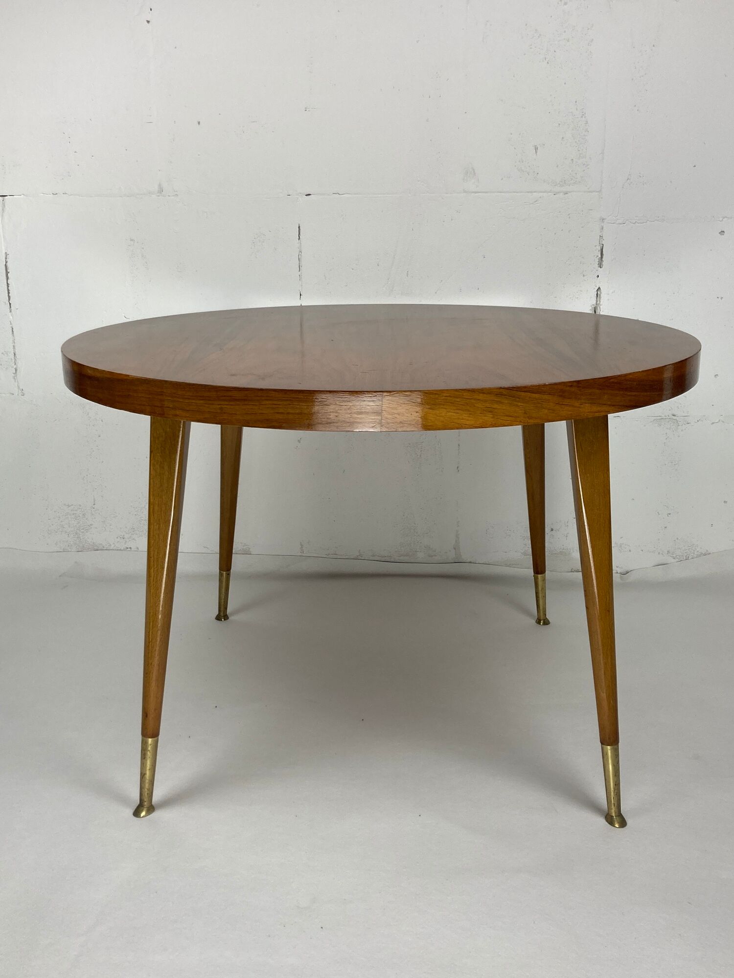 Italian round table with tapered brass leg ends, 1950s