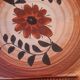 Hand-decorated earthenware trivet