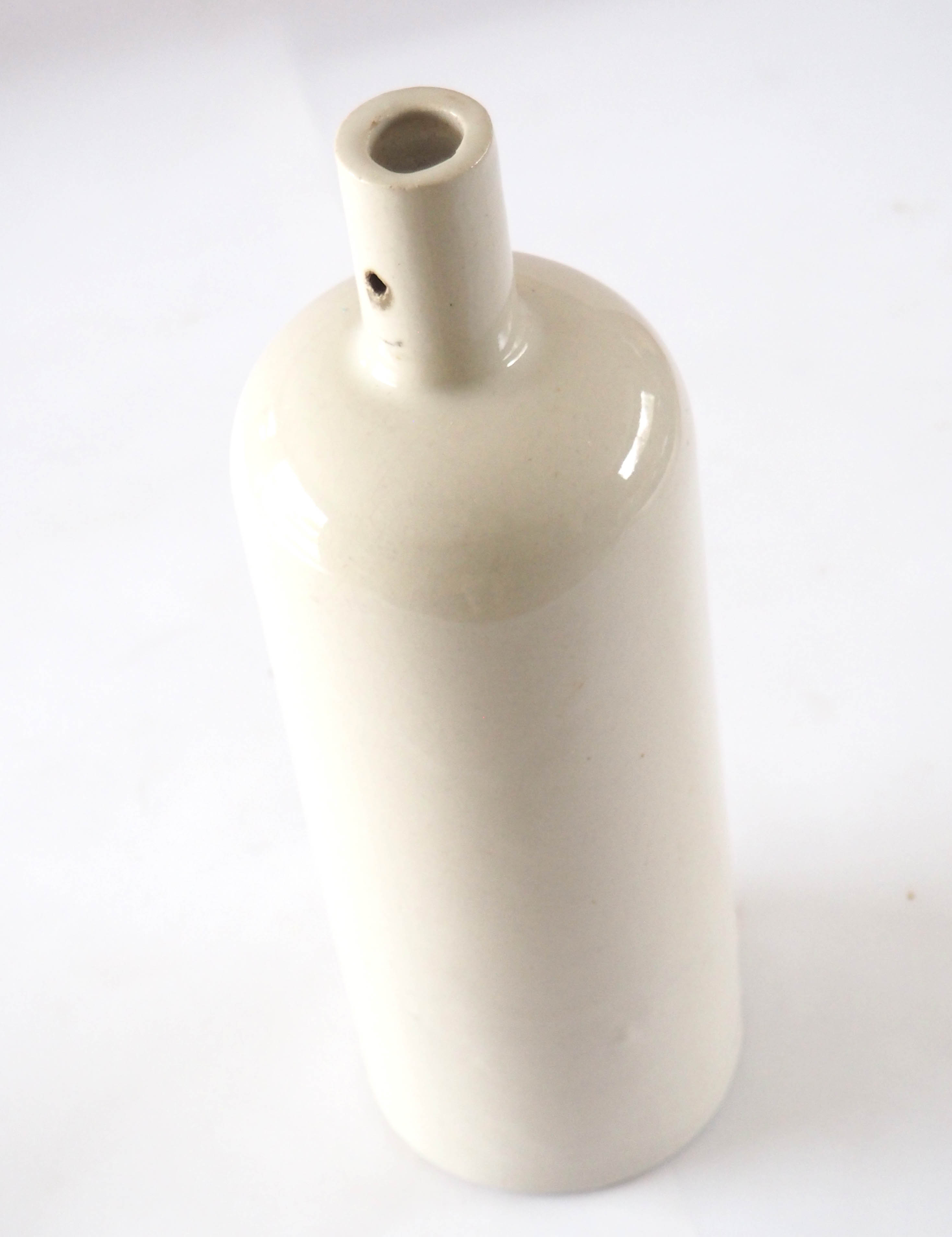 White sandstone bottle