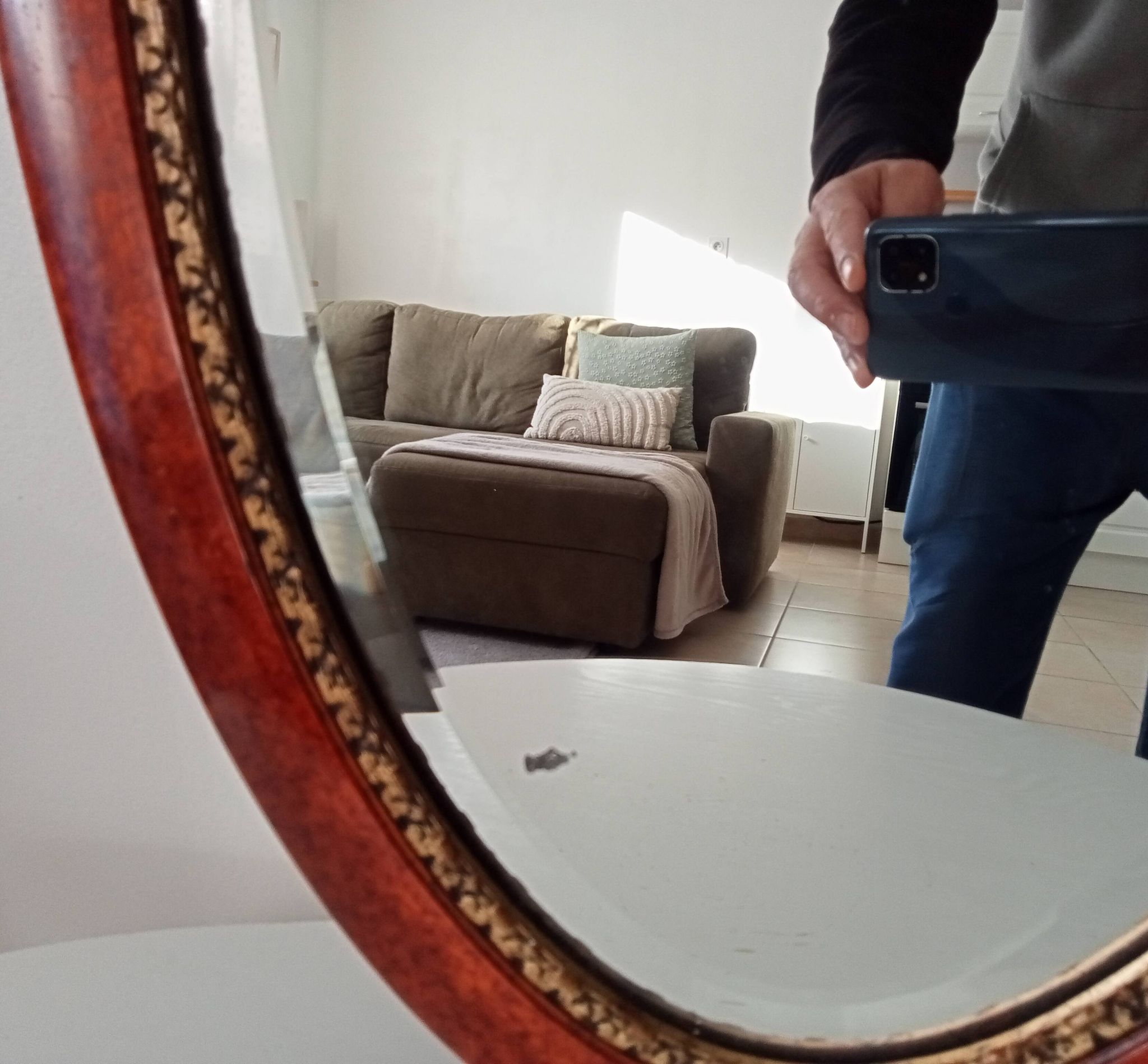 Antique oval mirror with bevelled glass