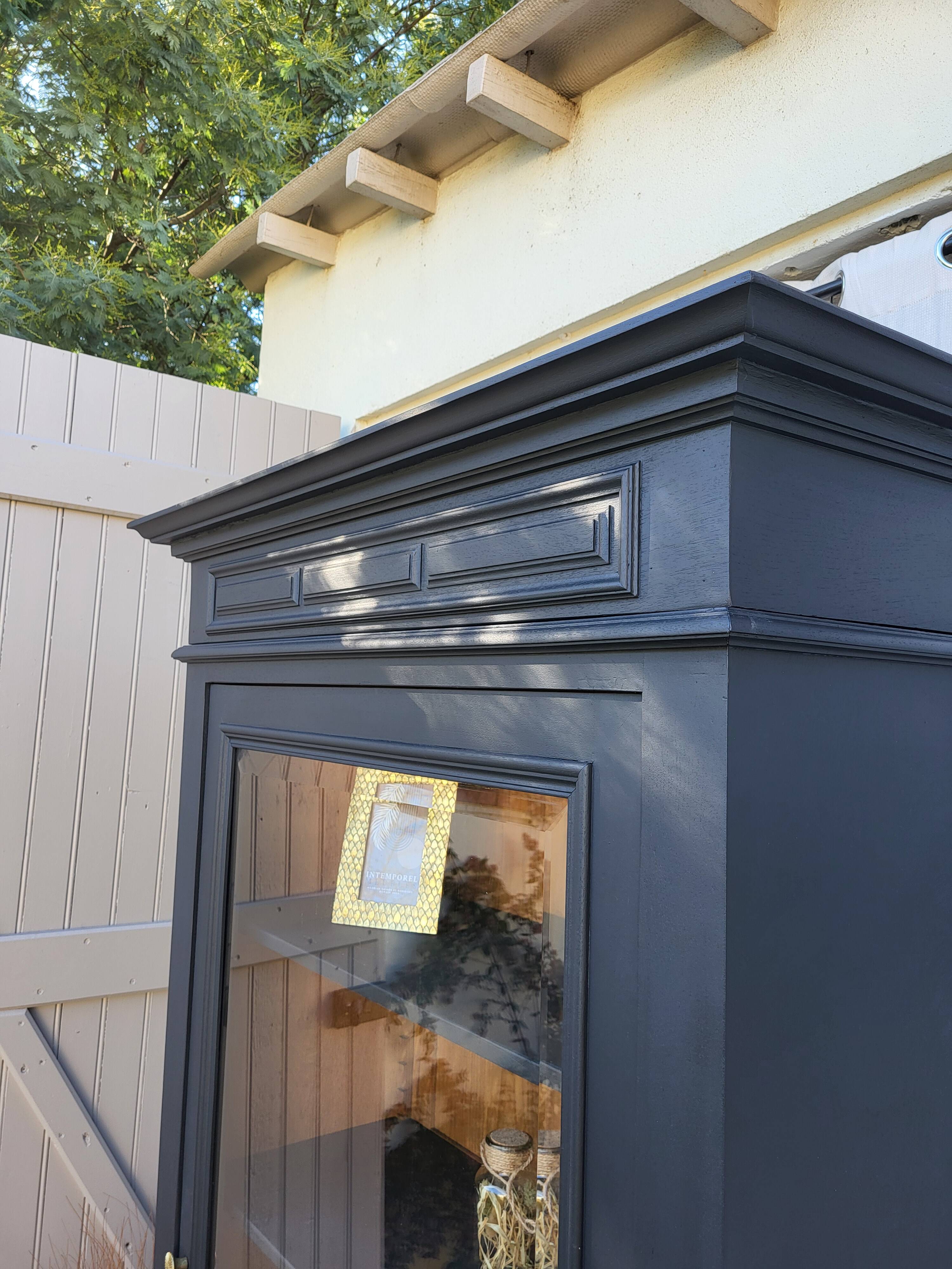 Black and raw wood dresser