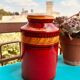 Red vase with engraved decoration, Aldo Londi for Bitossi, Italy, 1960s–1970s.