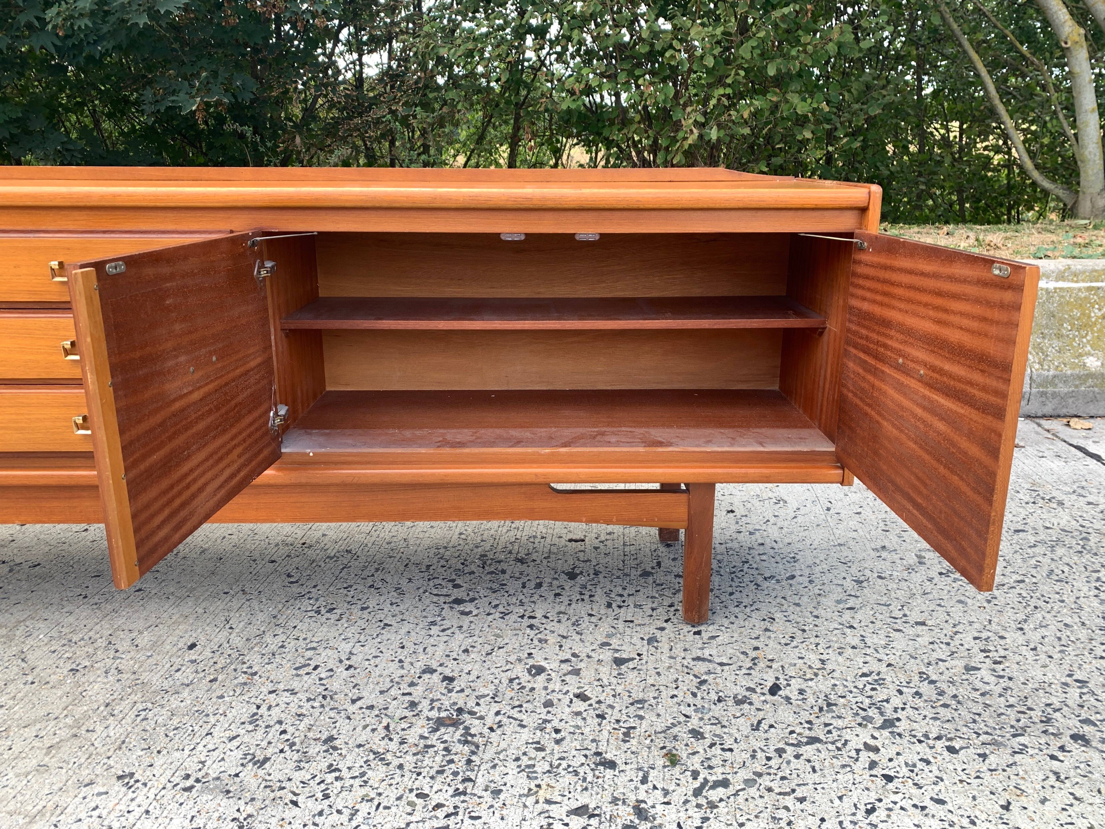 Teak enfilade from the 1970s by the English brand William Laurence.