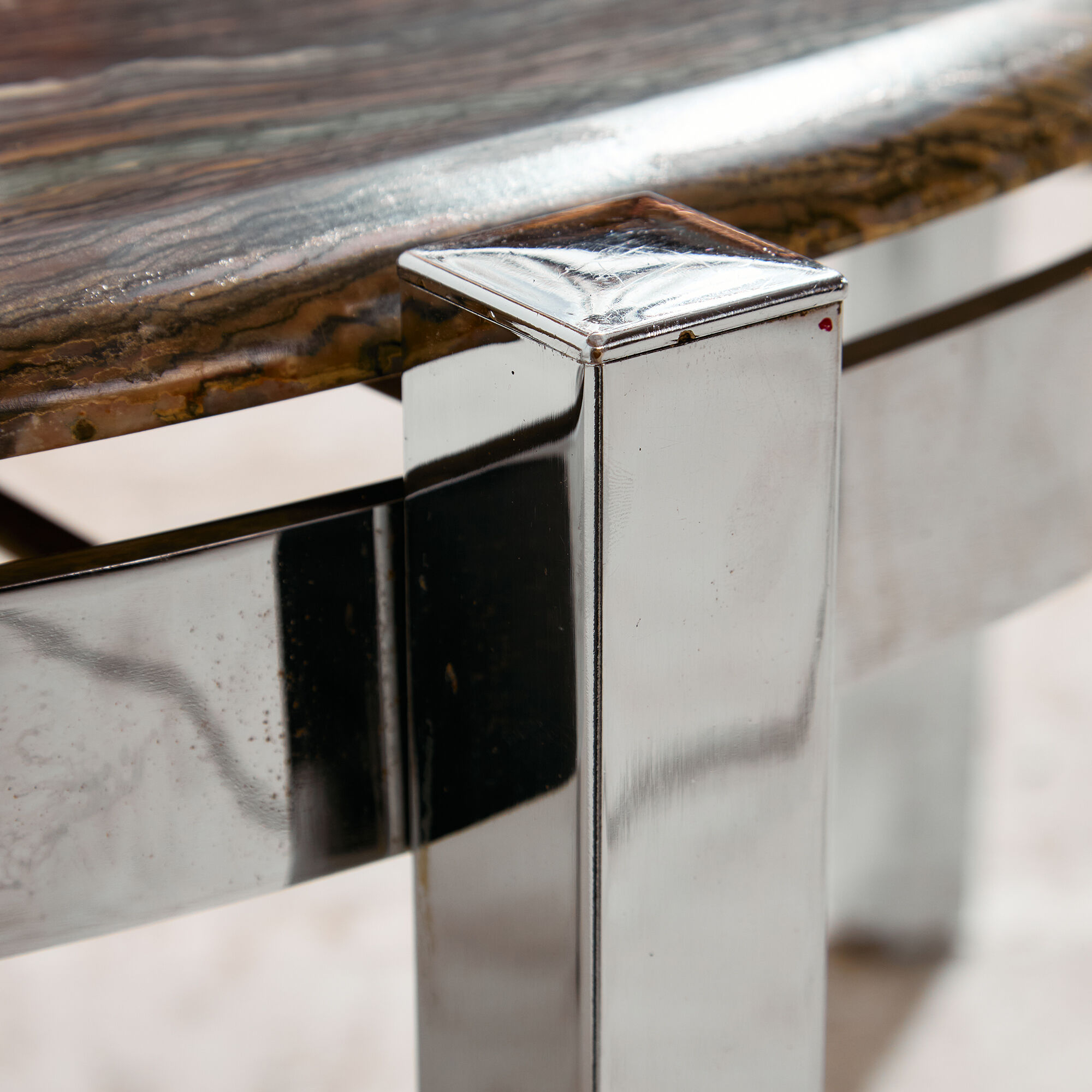 Coffee table with a stone top.