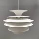 Hanging lamp with multiple layers of shades, by Junge/Vitrika