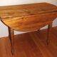 Round table with turned legs