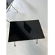 Modernist nesting tables in metal and black glass, 1950s.
