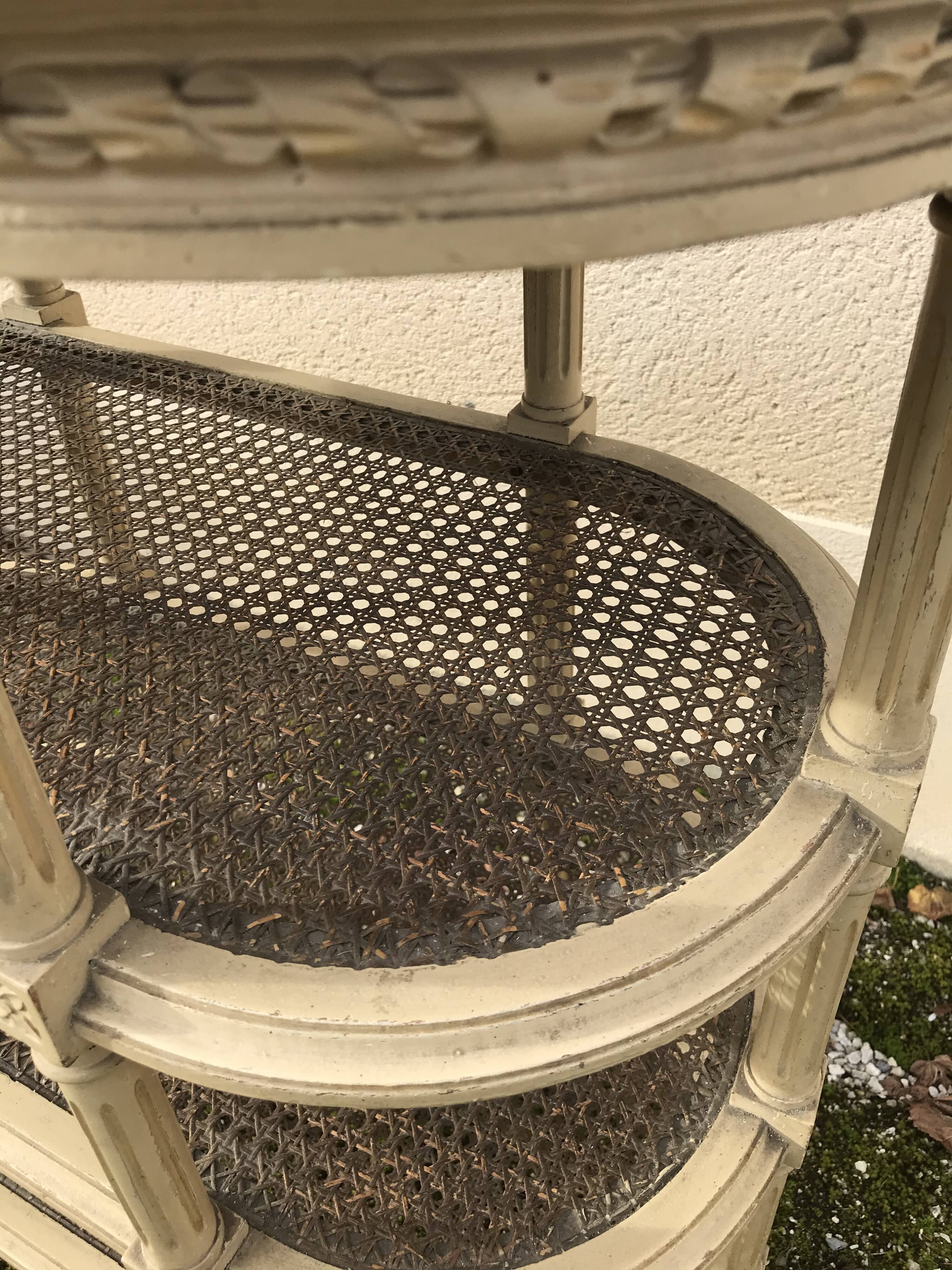 Wooden saddle on three shelves