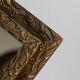 Antique mirror in gilded wood