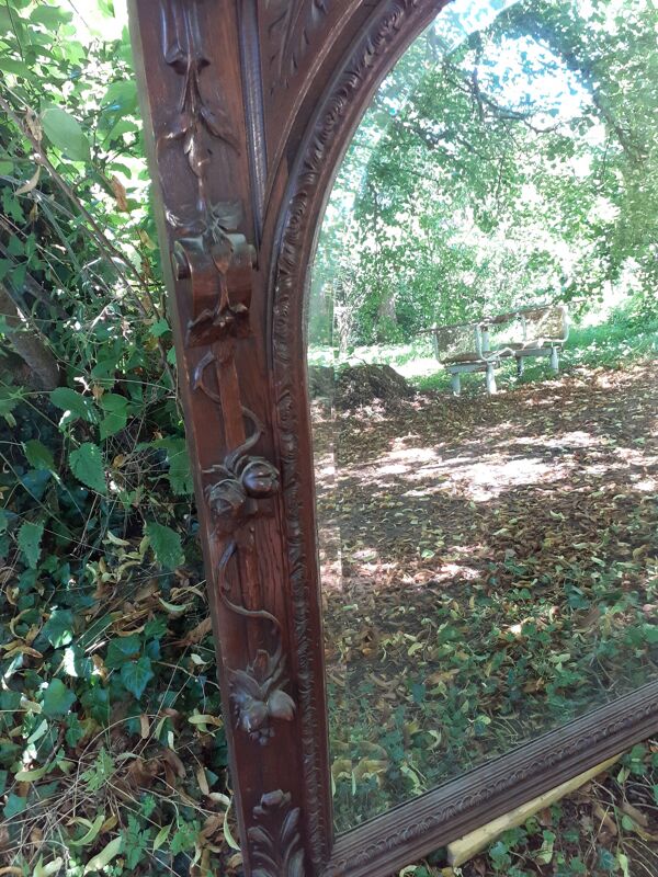 Trumeau miroir biseauté en chêne sculpté 104x144cm