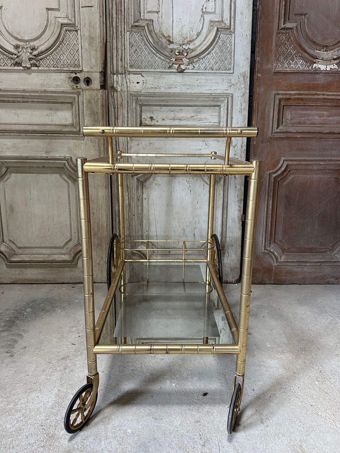 Vintage gold bar cart serving trolley
