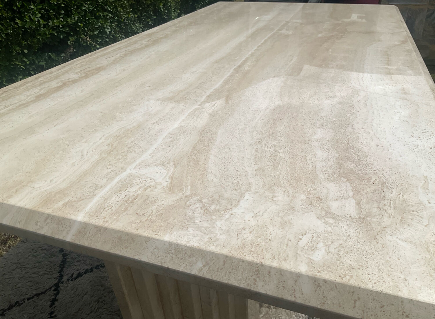 Large vintage dining table in travertine in the 1970s Carpa style.