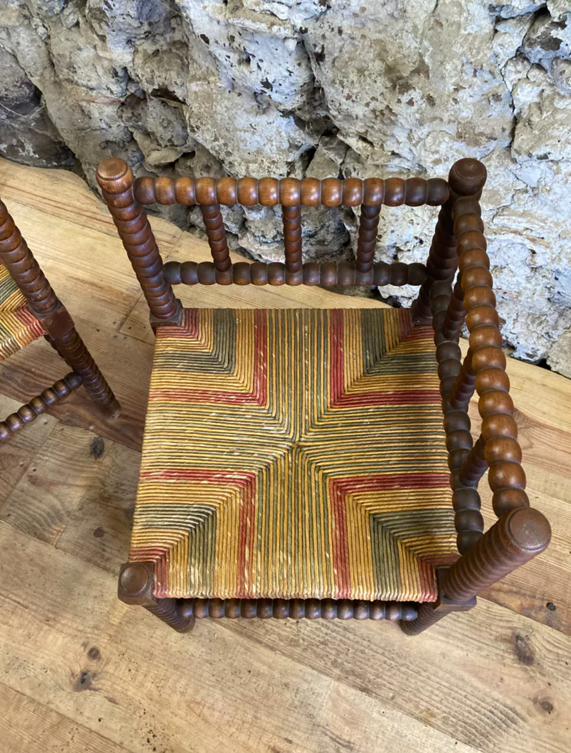 Pair of corner armchairs paillés in turned wood antique multicolored seat