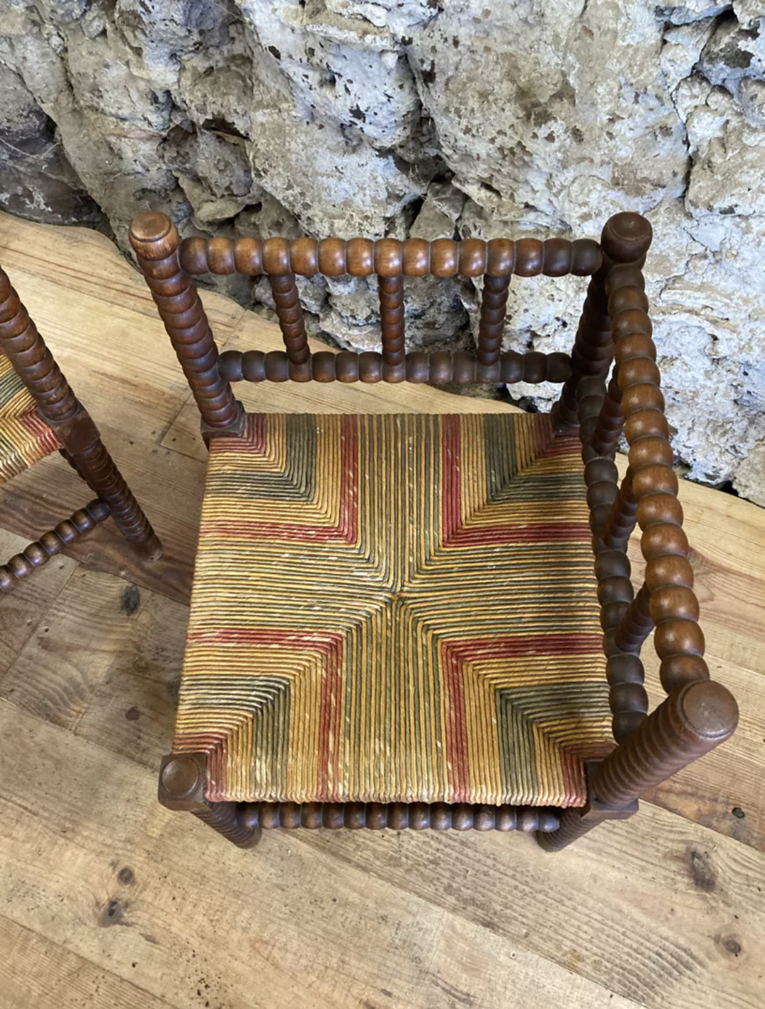 Pair of corner armchairs paillés in turned wood antique multicolored seat