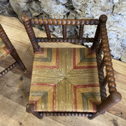 Pair of corner armchairs paillés in turned wood antique multicolored seat