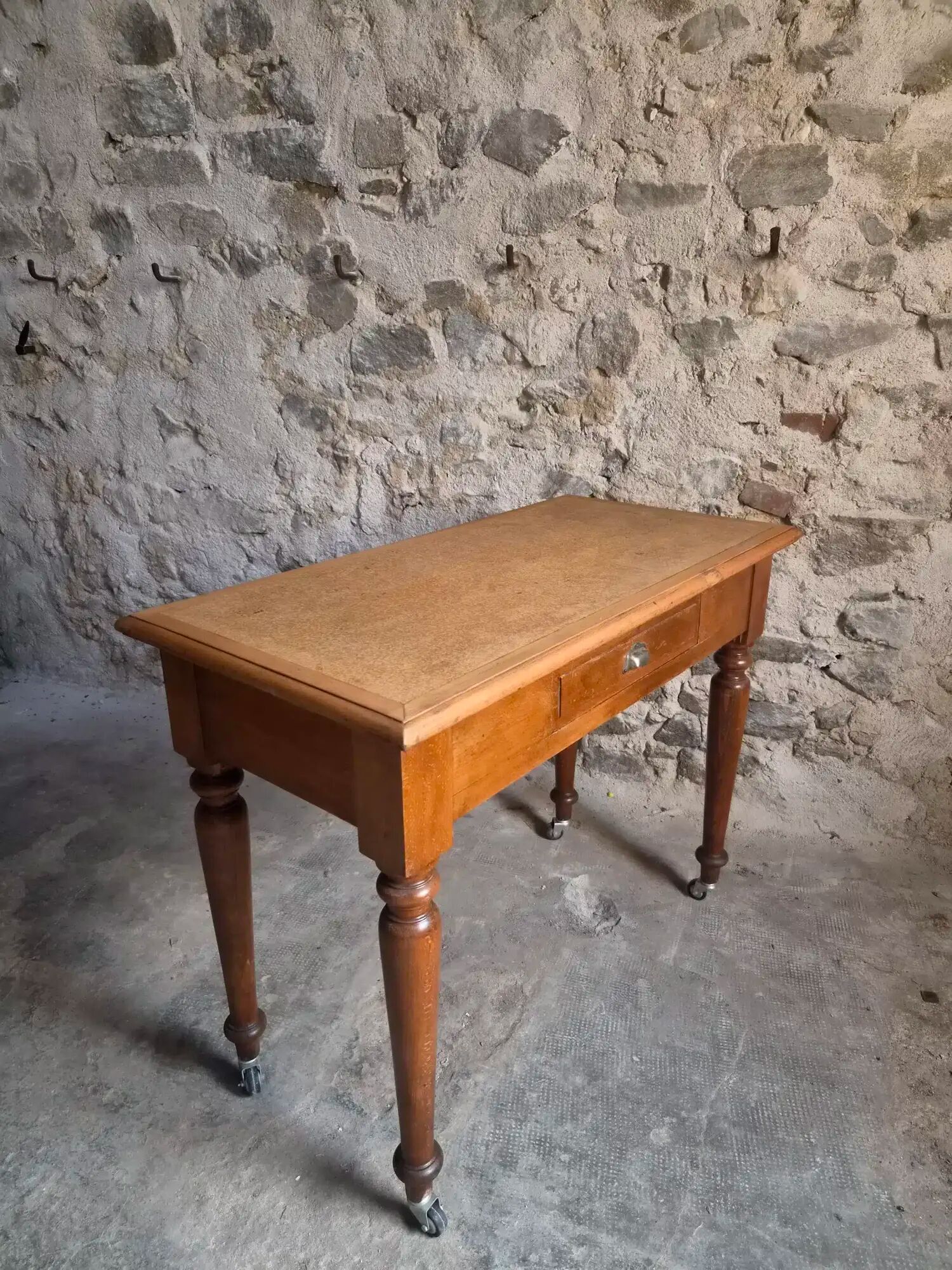 Vintage beech desk with a linoleum top and drawer.