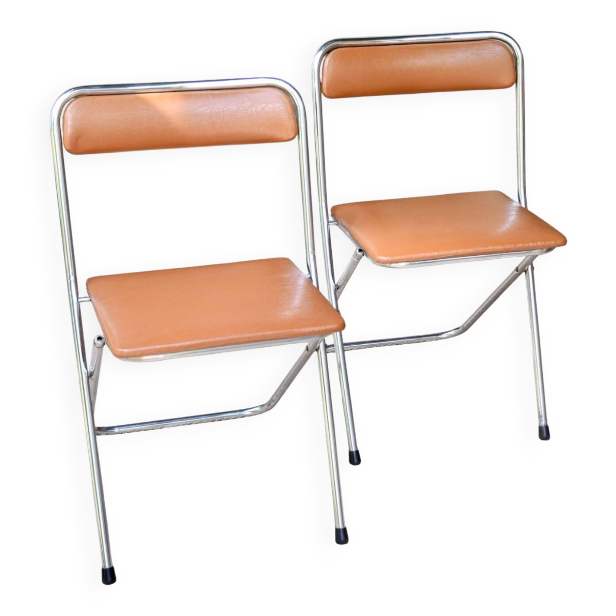 Pair of “Soudexvinyl” folding chairs in skai and chrome tube