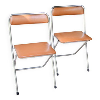 Pair of “Soudexvinyl” folding chairs in skai and chrome tube
