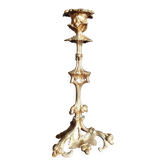 19th-century gilded bronze candlestick with leaf motifs, height 23.5 cm.