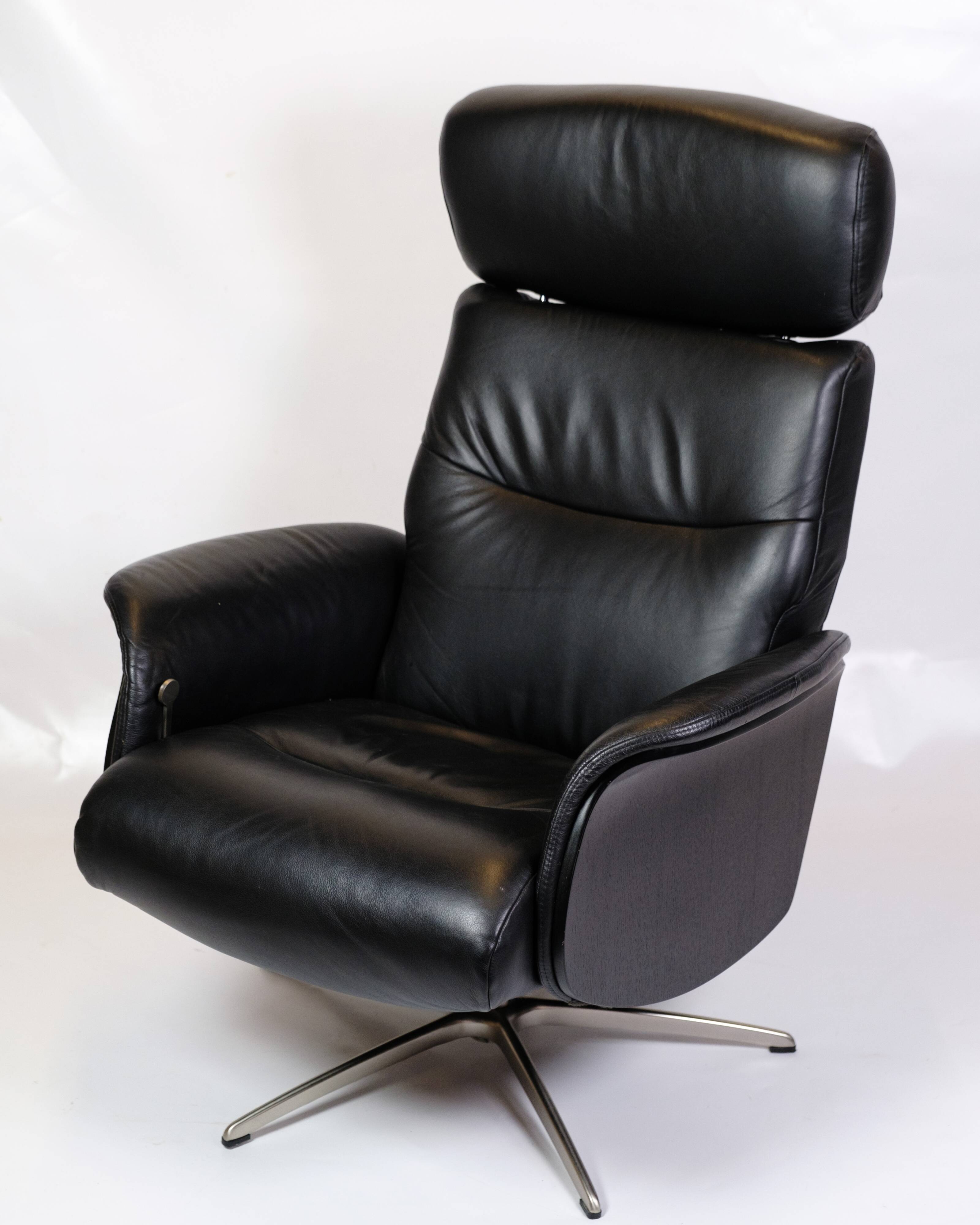 Lounge chair made in black leather & aluminium swivel from 1970s