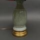 Napoleon III lamp in green cecidon on a brass base