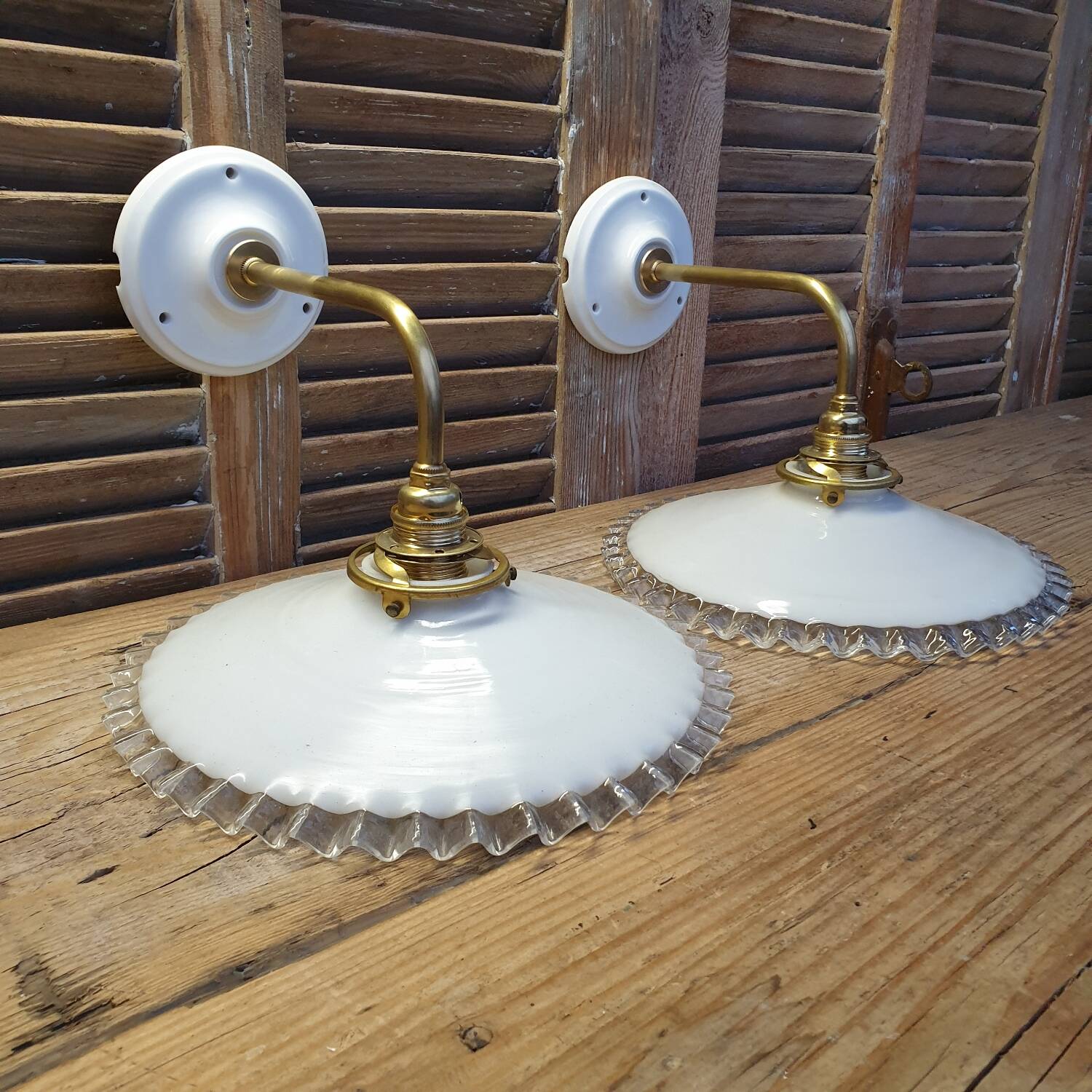 Pleated opaline swan neck wall lights