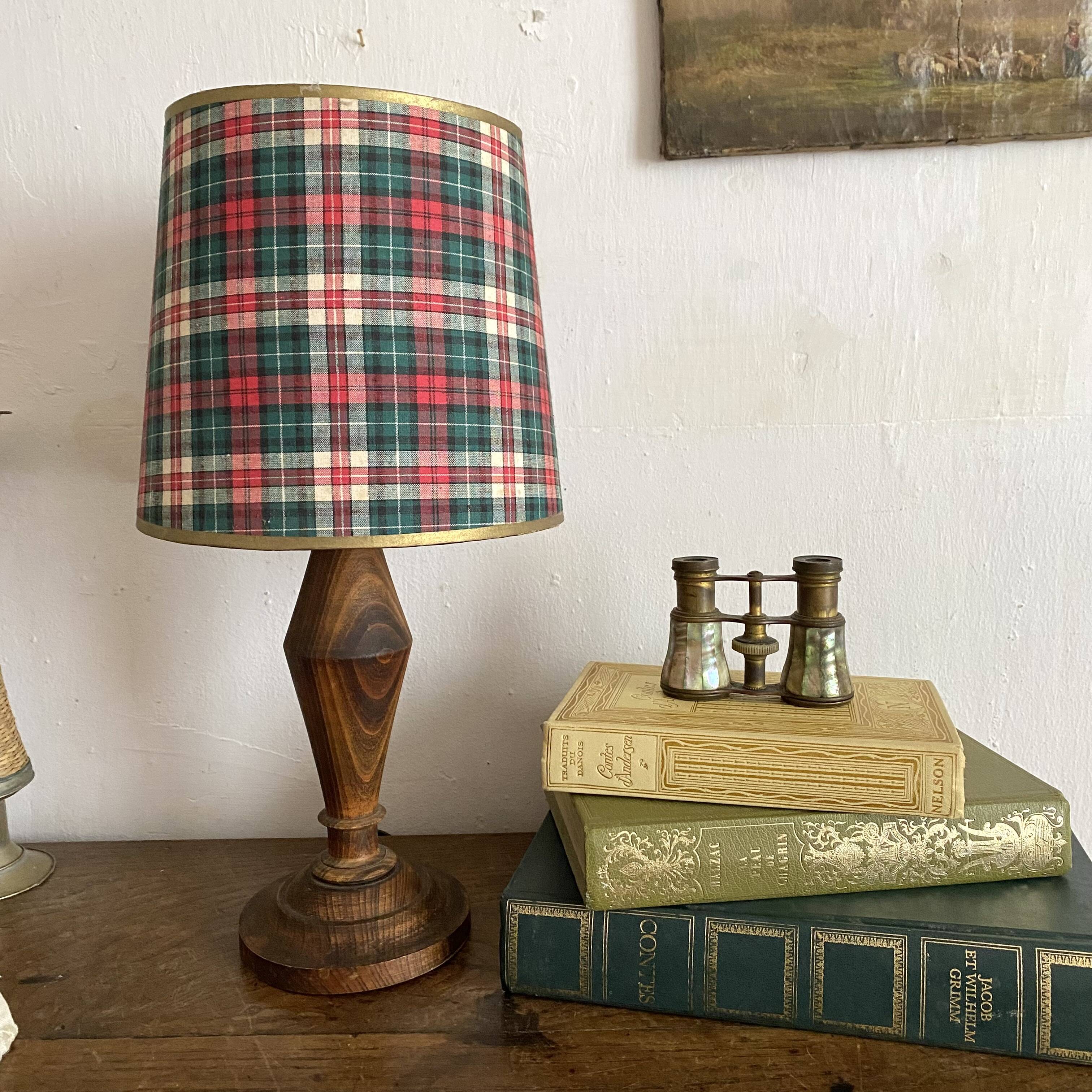 Turned wooden lamp, tartan lampshade.